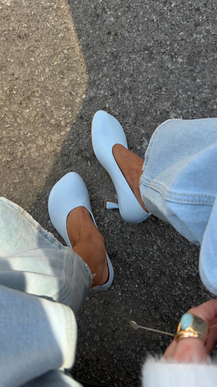 Refined in light blue leather heels
